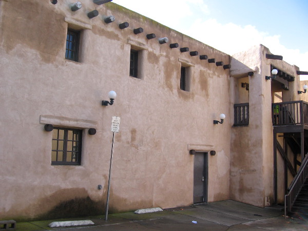 Patches of dampness add character to the side of the Balboa Park Club.