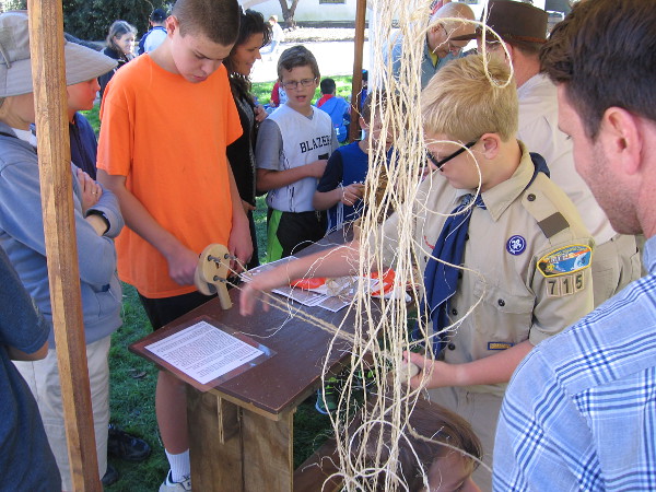 Scouts and other youth learn how rope was once made, using twisted fibers from native Yucca cacti.