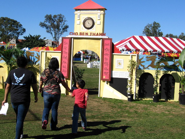 Visitors enter the San Diego Tet Festival as it opens late Sunday morning.