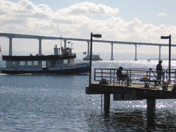The Silvergate ferry heads toward Coronado beyond the Embarcadero Marina Park South fishing pier.
