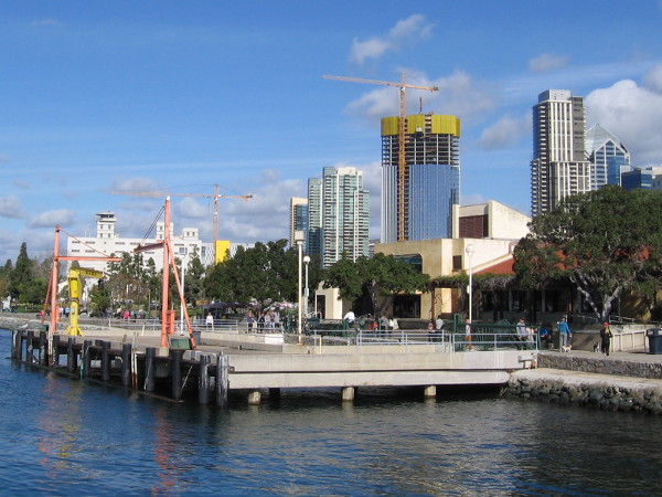 Lots of cranes in the skyline lately! The two nearby are for fishing boats. The big one on the left is for the new InterContinental Hotel. On the right, a high crane rises by the Pacific Gate by Bosa.