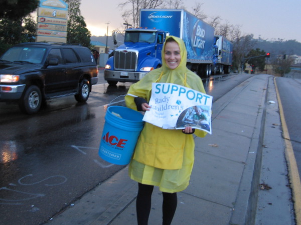 A smile in the rain. Please support Rady Children's Hospital in San Diego, where very sick kids get better. Everyone should have a full life.