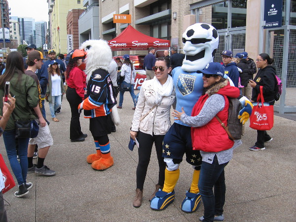 Fans of local sports teams pose with favorite mascots during the big Celebrate San Diego event at Petco Park!