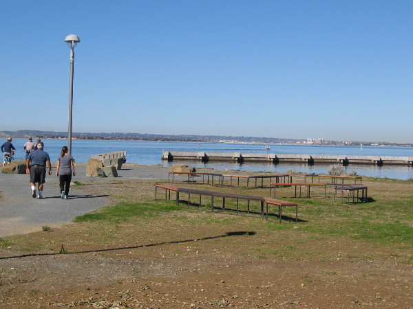 At the north end of Bayside Park, we now approach some unusual temporary art. Bench Party, by artists Jose Parral and Tasia Paulson, will be on display through May 20, 2017.