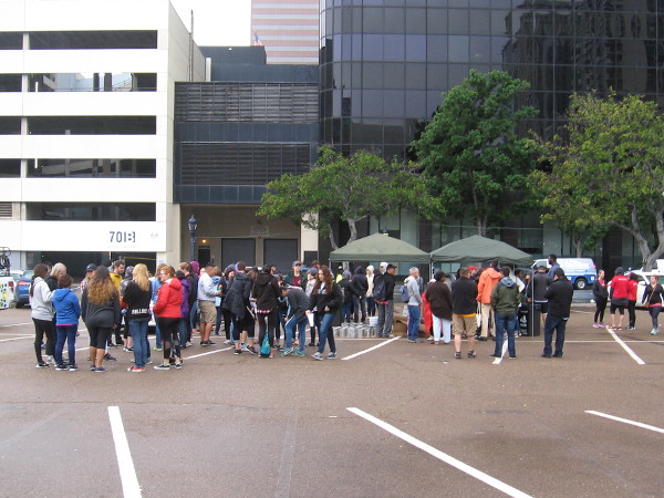 Around 150 volunteers had signed up to paint lamp posts. Many had gathered at Eighth Avenue and B Street just after nine o'clock when I walked through the area.