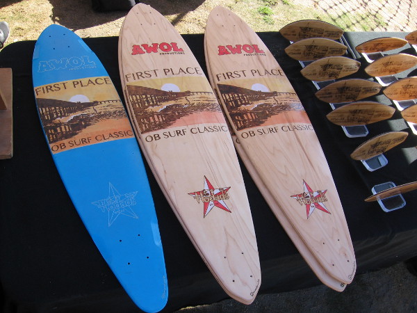 I believe the winners in different categories would take home one of these small surfboards.