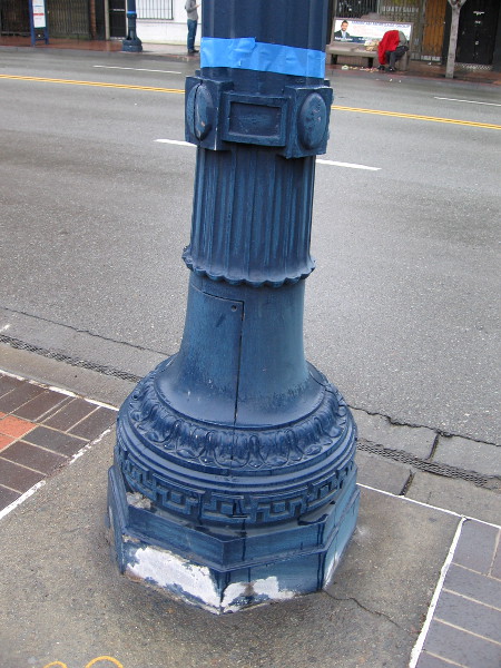 The base of a downtown lamp post has been primed and is ready to be painted by volunteers. Hundreds of posts would be painted today!