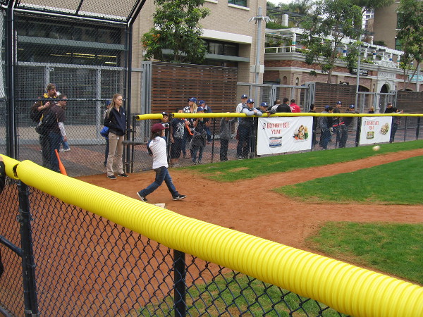 The small baseball diamond at Park at the Park was alive with excitement. This young fan smashed a line drive.