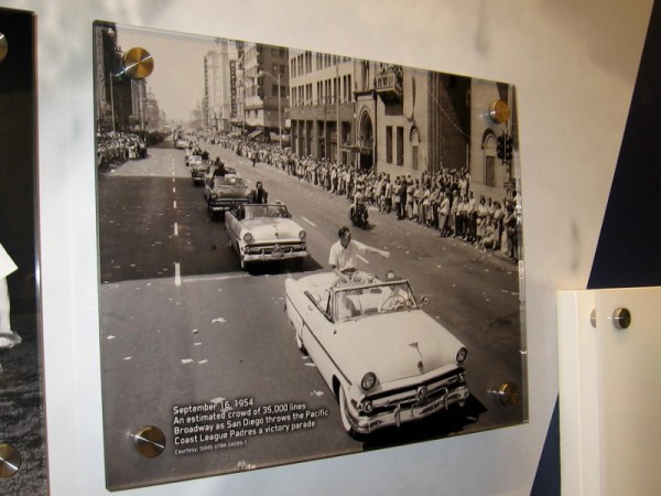 1954 photo of big celebration parade along Broadway in downtown San Diego. The Padres finished first in the Pacific Coast League.