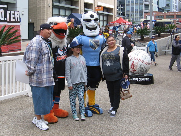 Posing for photos with Gulliver, the San Diego Gulls hockey mascot, and Sunny the Socker, the new mascot of the San Diego Sockers!