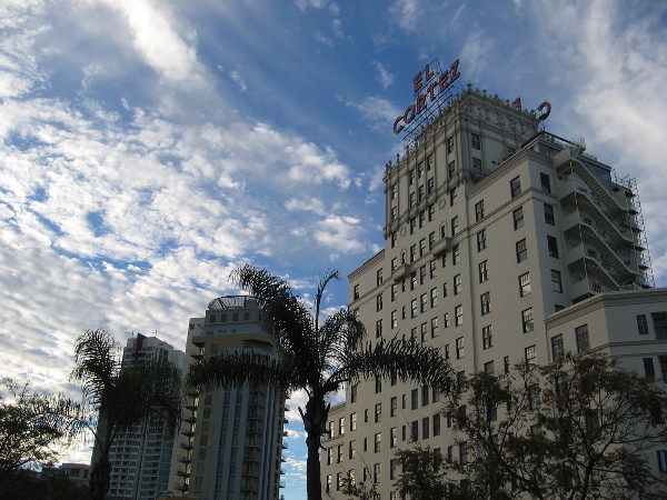Amazing clouds paint the blue sky above the landmark El Cortez and other nearby, more modern high-rises!