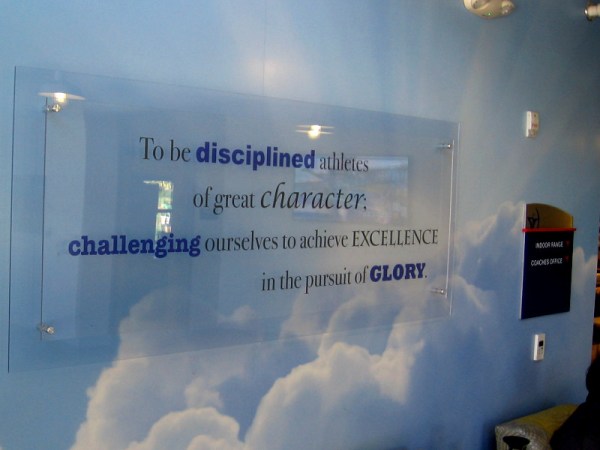 Words inside the archery building at the Chula Vista Elite Athlete Training Center. To be disciplined athletes of great character; challenging ourselves to achieve excellence in the pursuit of glory.