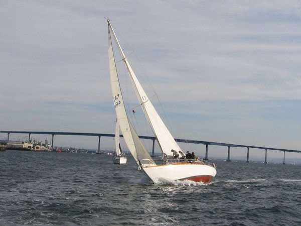 Here comes a speedy sailboat behind us!