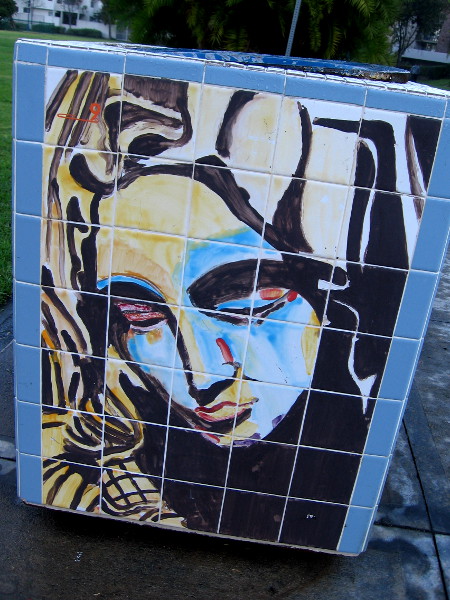 One side of the Envirocan features a female face. Perhaps it is Mother Earth.