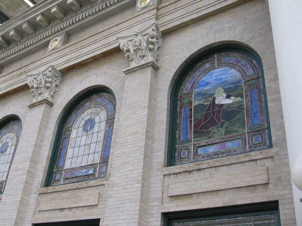 Stained glass windows seen from the outside.