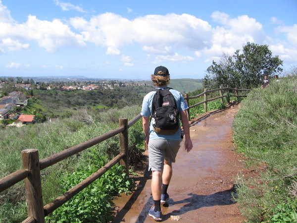 Another hiker, starting up toward the summit, appears to be prepared. A nearly 1000 foot climb is required. One should wear sturdy shoes and bring water. There is no shade.
