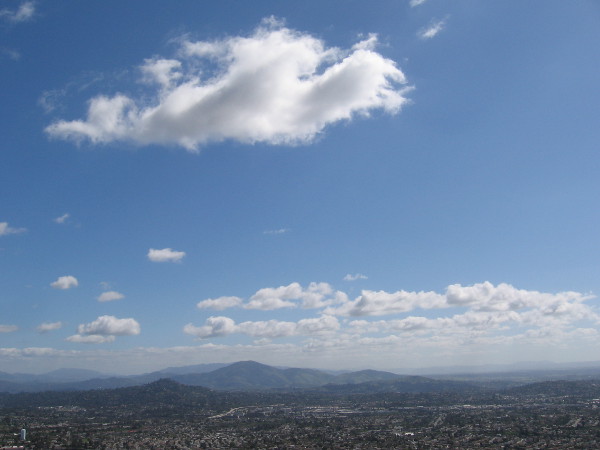 A far view from high above San Diego. Looking to the southeast, I see prominent San Miguel Mountain. My hike earlier in the day was a bit north of that mountain in East County.