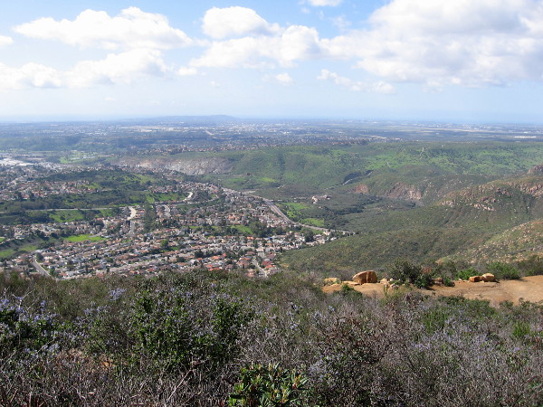 Gazing to the west one can see Mount Soledad, and distant office buildings in University City (also called the Golden Triangle) and Sorrento Valley. The ocean is a thin blue thread.
