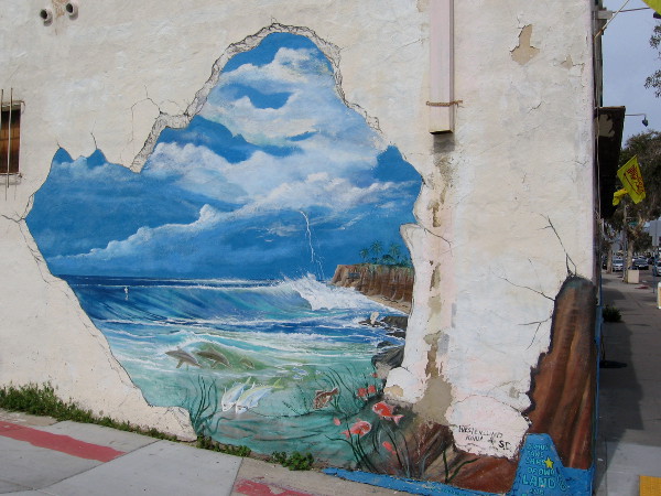 There seems to be a large hole in this wall. I see ocean waves through it!