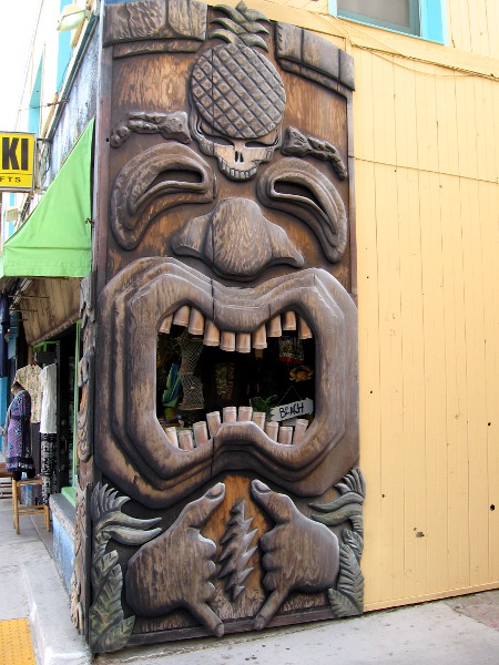 A wacky tiki character on a corner of a Mission Beach shop.