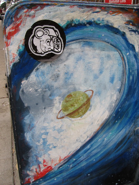 A ringed planet appears to be surfing! Cosmic, dude!