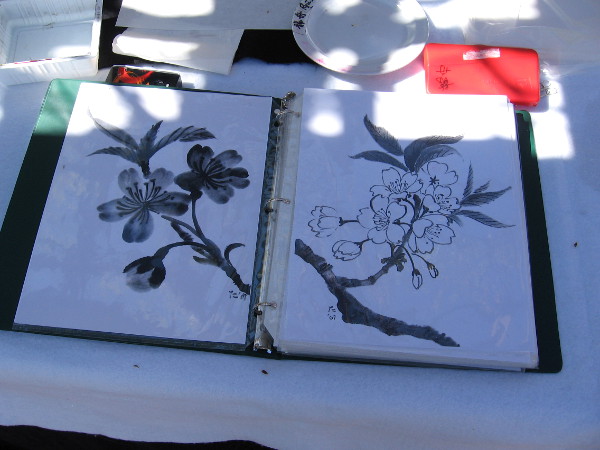 Some ladies at one table were demonstrating Japanese brush painting. A special exhibition in Balboa Park's Casa del Prado will take place March 25 and 26.