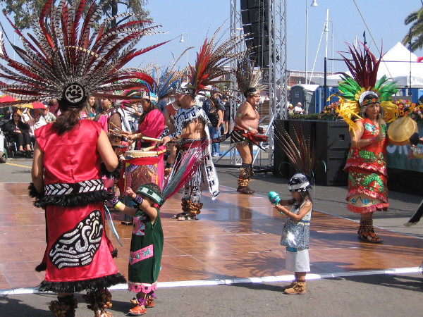 Dancers of all ages participate in several ancient Aztec dances, including a Rain Dance.