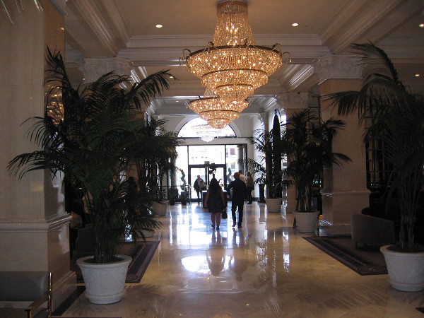 Standing in the grand lobby, looking south toward the U.S. Grant Hotel's entrance on Broadway.