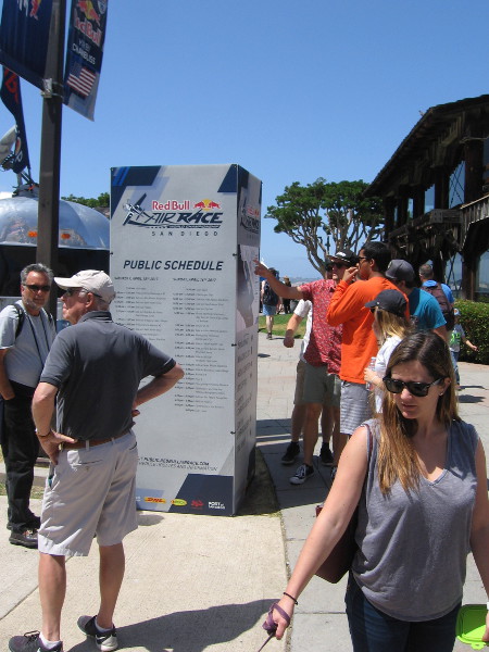 Near one paid entrance, at Embarcadero Marina Park North, a sign showed the event schedule and provided info about the Red Bull planes and pilots.