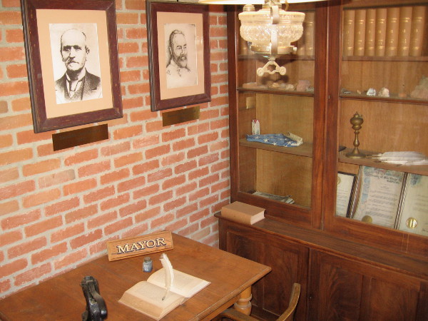 This room in the small building was the mayor's office. Portraits of some early San Diego mayors are on the wall. Joshua H. Bean was San Diego's first mayor, elected in 1850.