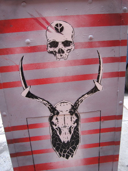 More skulls include an upside-down peace sign--sometimes a symbol of death.