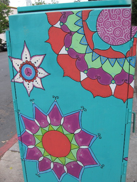 An abstract flower has a peace sign right-side-up. Perhaps an affirmation of life.