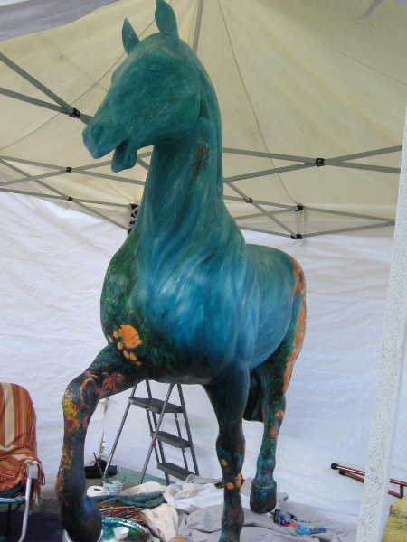 This impressive, lifelike horse sculpture is painted with images of underwater ocean life.