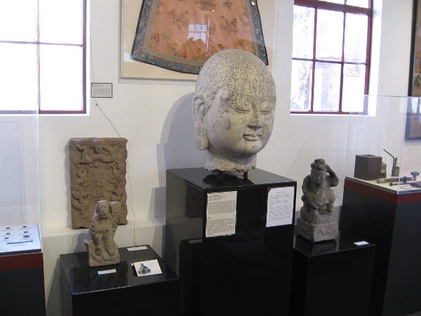 The limestone Buddha head of the Northern Qi Dynasty, was originally carved into a cave in Shanxi Province.