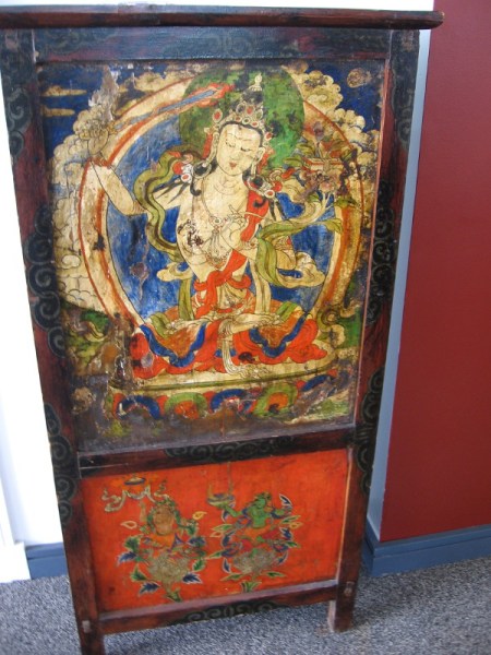 Manjusri altar table, from the late 19th century. Manjusri is the Bodhisattva of wisdom--he holds a sward that cuts through ignorance and illusion.