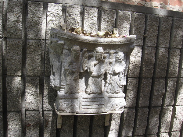 Ornamental carving along the peaceful path.