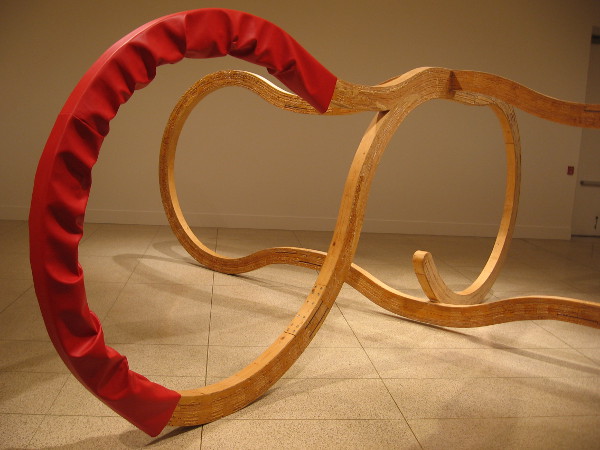 Double Talk by artist Richard Deacon, winner of the Turner Prize. Laminated wood and imitation leather. 1987.