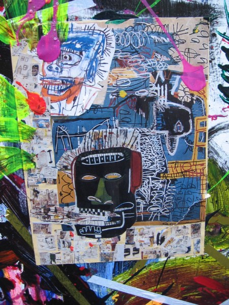 Inside all of that color is a complex, detailed collage including abstract faces.