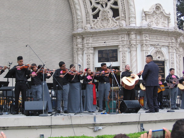 The City Heights Music School Mariachi Ensemble plays for the large crowd.