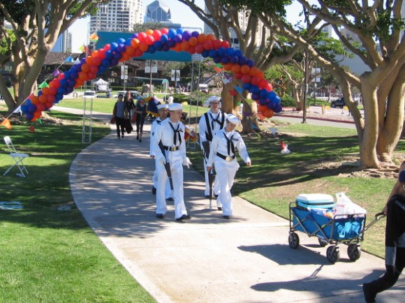 A youthful honor guard arrives before the ceremonies begin.