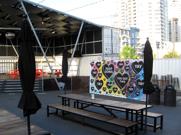 A mural by the Quartyard stage attracts attention.