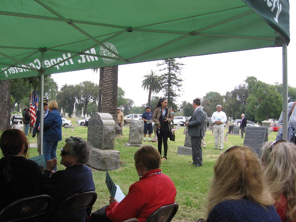 While some gathered for the ceremony, others read the nearby gravestones and wondered at the sacrifices made long ago.