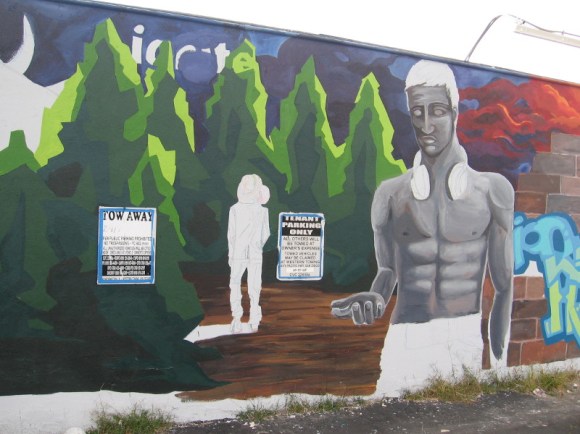 A few days later, a human figure in the mural is coming to life. I look forward to seeing the finished work!