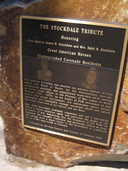 A plaque on a boulder by the flagpole. The Stockdale Tribute. Vice Admiral Stockdale and his wife Sybil were distinguished Coronado residents.