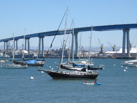 Boats moored between Coronado and the bridge. San Diego's shipyards can be glimpsed on the other side of the bay.