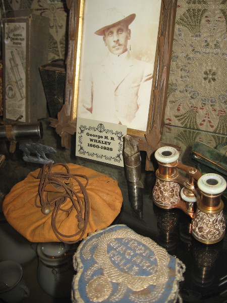 Inside the display one can see an old photograph of George H. R. Whaley, one of the six children of Thomas and Anna Whaley.