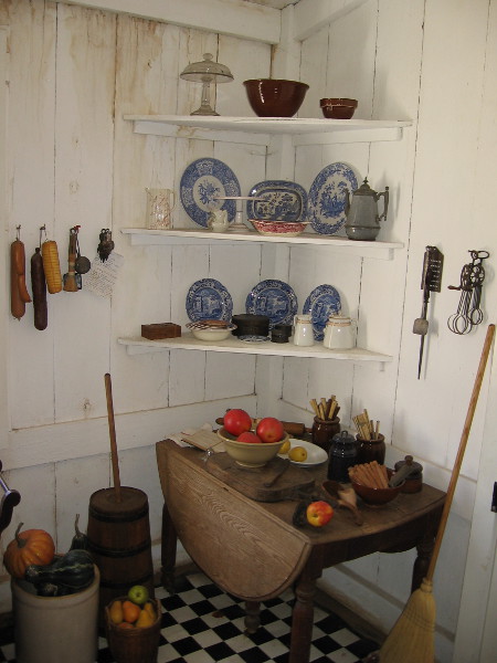 Many of the dishes and utensils are original. Prepared food would be passed through to the adjacent dining room.