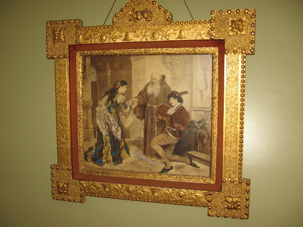 Painting in the theater from Shakespeare's Romeo and Juliet. On the opposite wall hangs a painting from Othello.