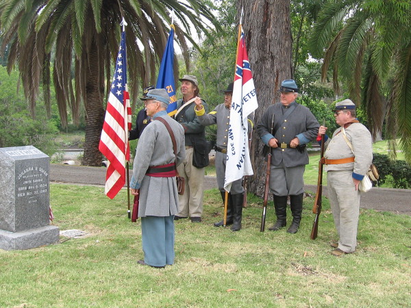 Some participants wore Civil War uniforms--both blue and gray. They posted the flags and provided a musket salute.