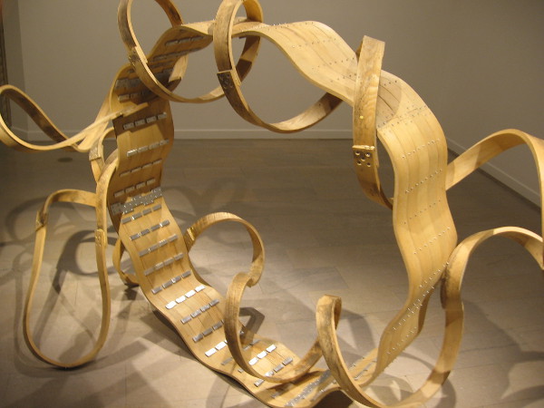 Eyes are met with an astonishing work of abstract art. Dancing in Front of My Eyes, 2006. Wood, aluminum.